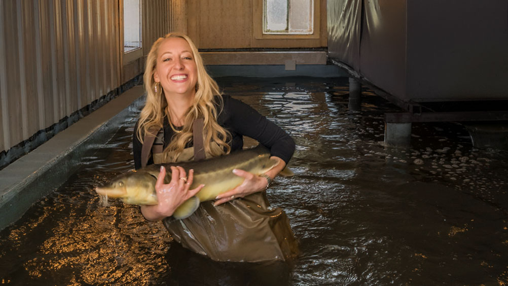 Kristen McGee at the Swedesboro sturgeon farm